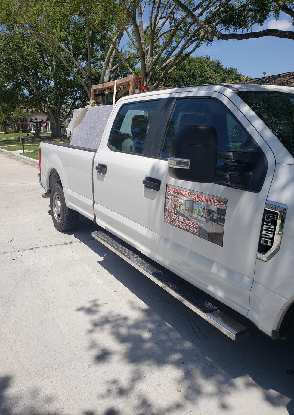 The B Master Truck pulling Up to another great client