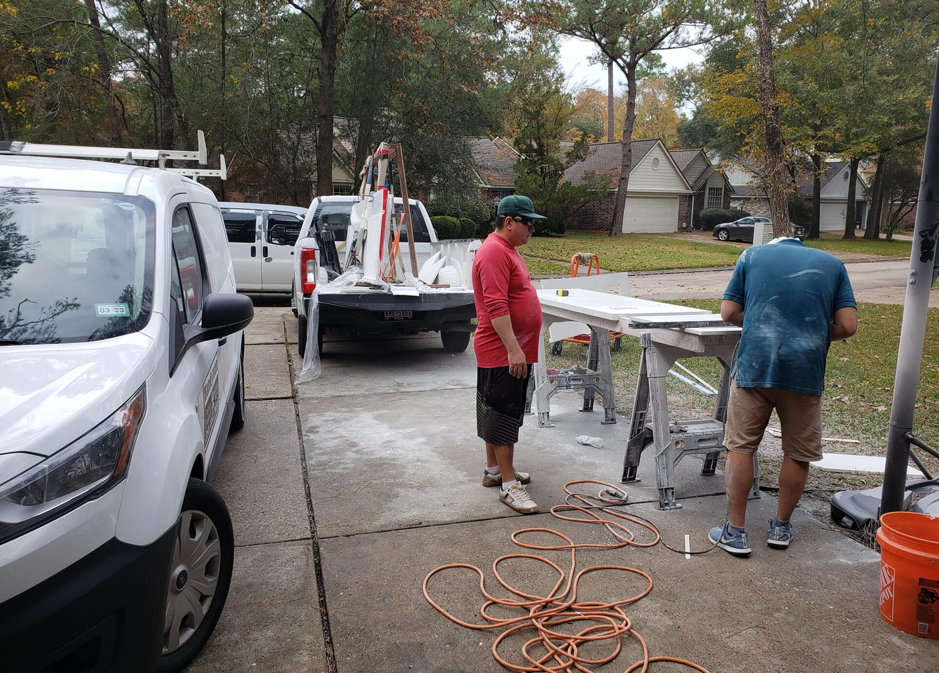 Workers of B. Master Granite expertly cutting stone to be installed.